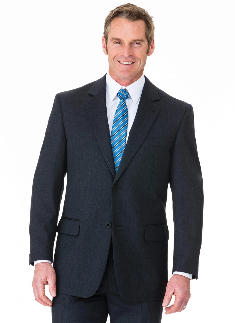 Man wearing a Fletcher Jones Mens wear charcoal colour suit with a white shirt and a blue striped Tie - Men